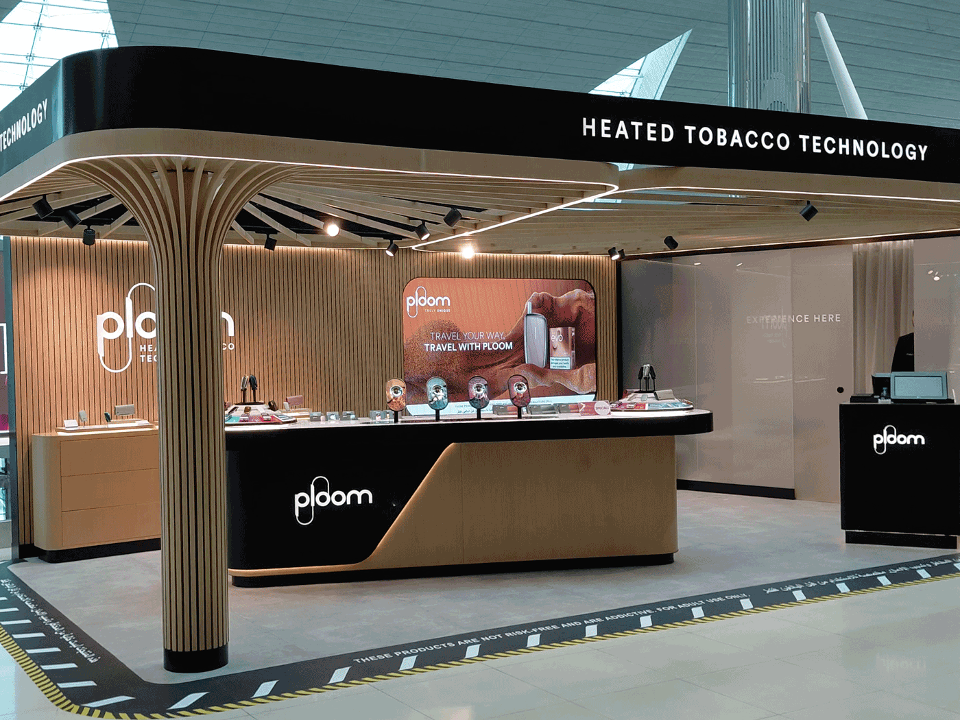 ploom pop up dubai airport terminal 3 retail display